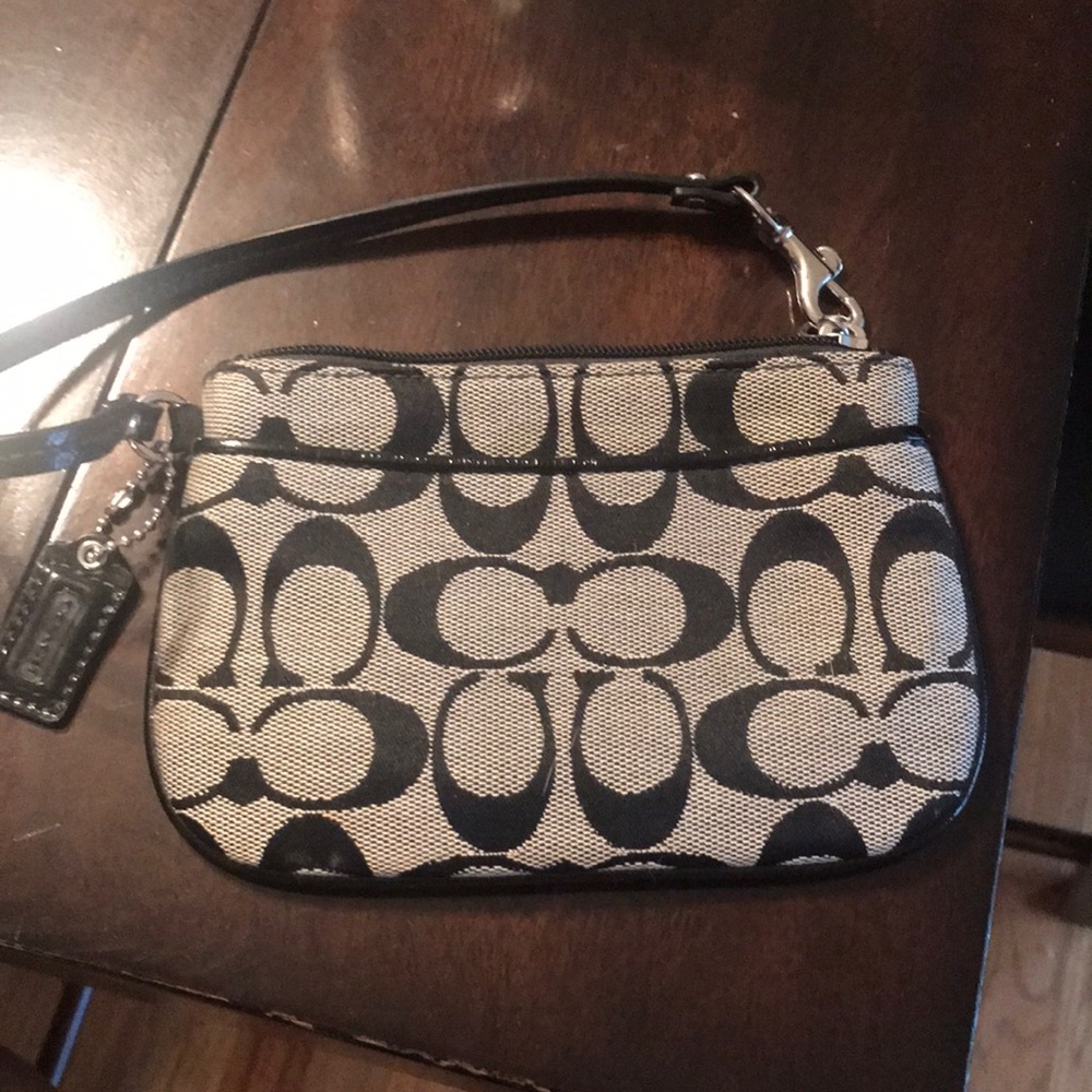 Black and gray coach clutch